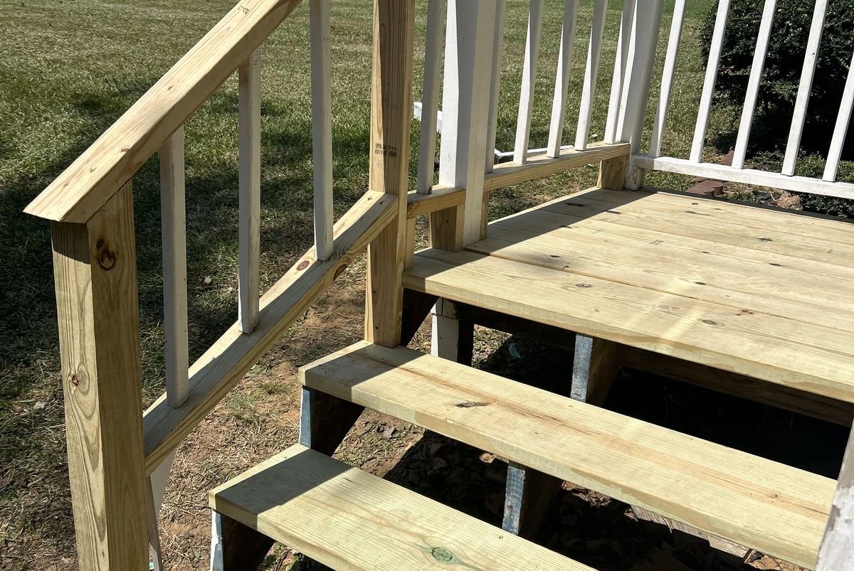 New pressure-treated lumber deck construction