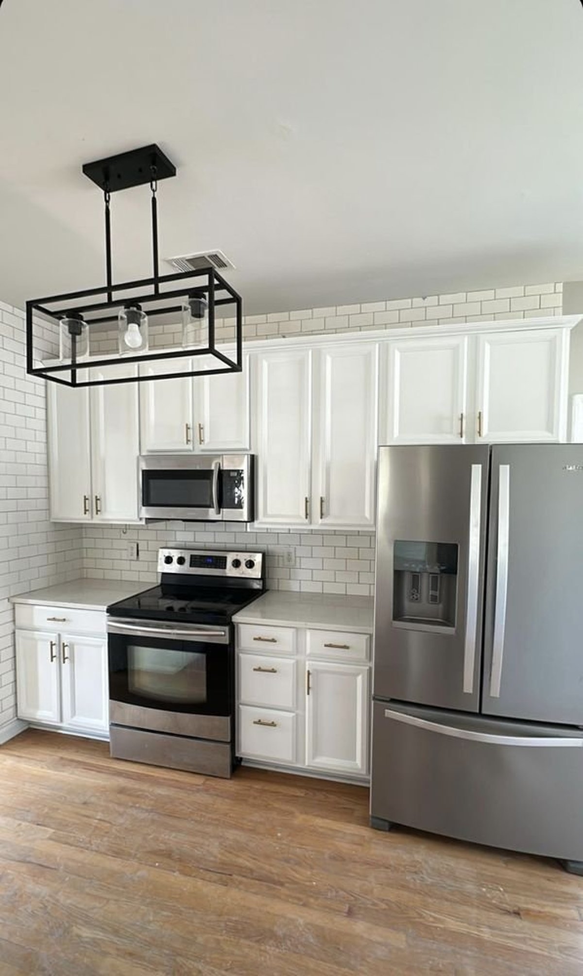 Professional kitchen pendant light fixture installation